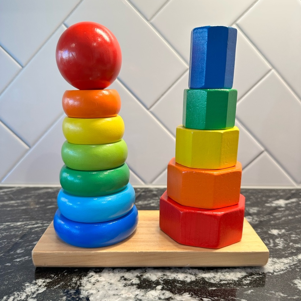 Melissa & Doug Wooden Rainbow Geometric Stacker Baby Toy